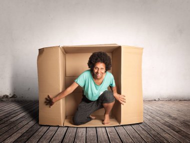happy black woman inside a Box on a room clipart