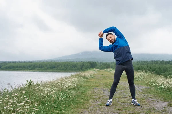 Man exercising outdoor on gloomy day