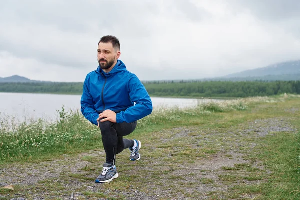 Man exercising outdoor on gloomy day