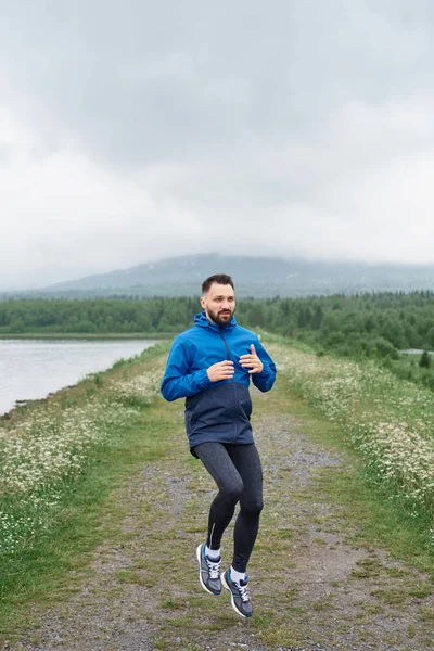 Man exercising outdoor on gloomy day