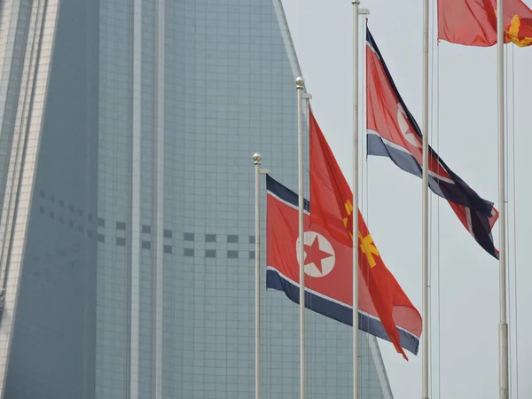 Bandera Corea Del Norte Sobre Pyongyang Imagen De Stock