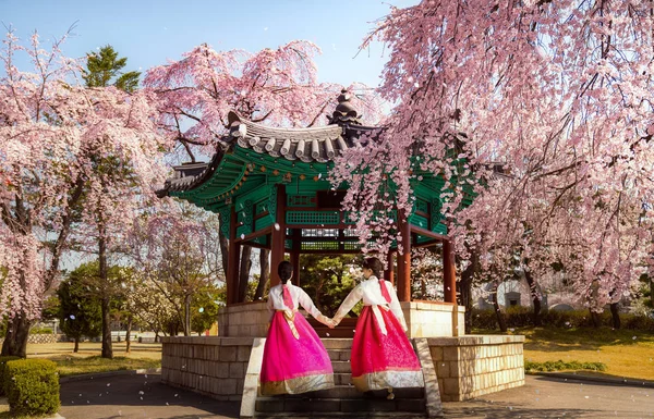 Korean lady in hanbok dress walking  on pavilion in Seoul National Cemetery, Seoul city, South Kirea