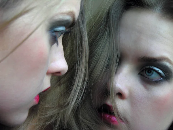 closeup portrait of attractive woman near the mirror , selective focus