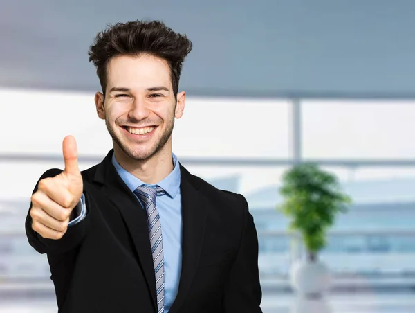 Smiling Young Businessman Showing Thumbs — Stock Photo, Image