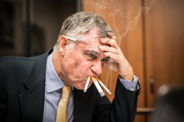 Nervous Businessman Smoking Many Cigarettes Once — Stock Photo, Image