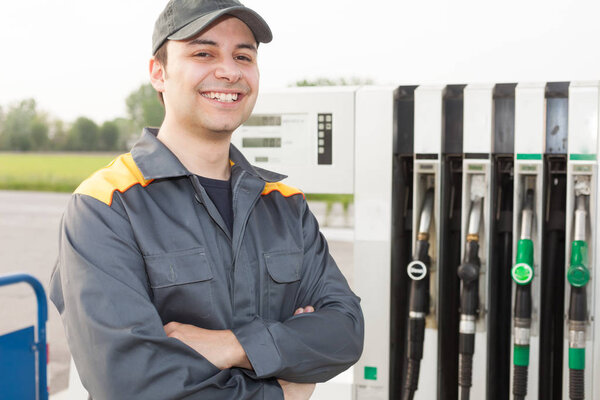 Smiling worker at the gas station