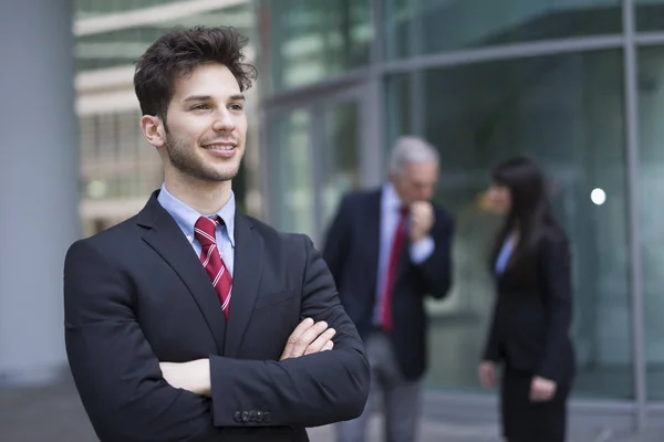 Handsome Young Businessman Front Colleagues — Stock Photo, Image