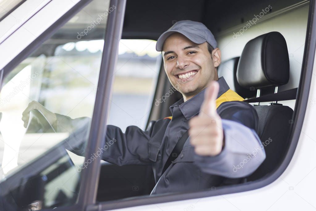 Smiling van driver showing thumb up 
