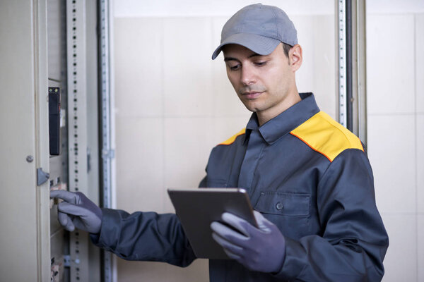 Portrait of an electrician at work
