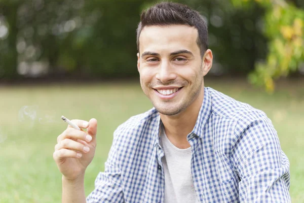 Man Smoking Cigarette Outdoors — Stock Photo, Image