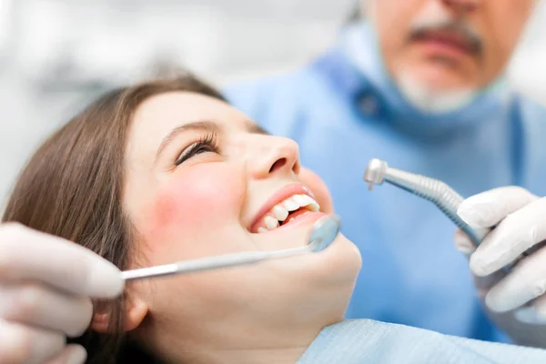 Woman Receiving Dental Treatment — Stock Photo, Image