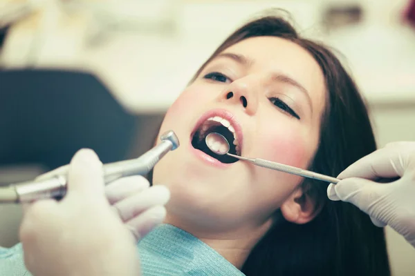 Woman Receiving Dental Treatment — Stock Photo, Image