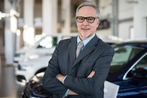 Car Dealer Salesman Front Car His Showroom — Stock Photo, Image