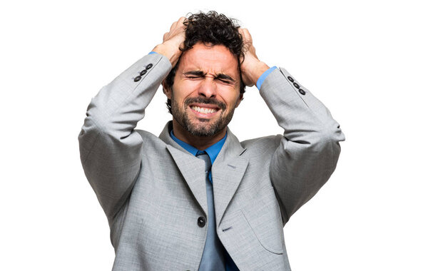 Desperate businessman isolated on white background, financial crisis concept