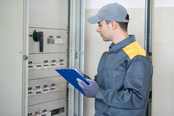 Electrician Inspector Checking Industrial Distribution Board Factory — Stock Photo, Image