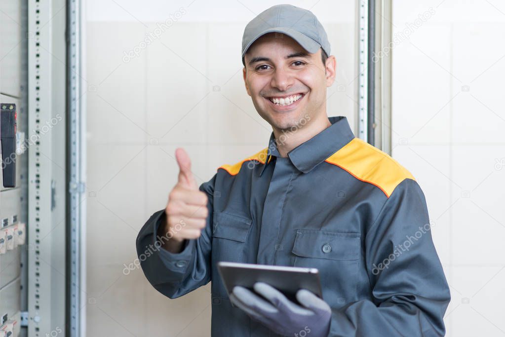 Portrait of an electrician at work