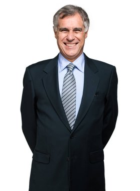 Kendine güvenen olgun bir iş adamının yakın portresi.