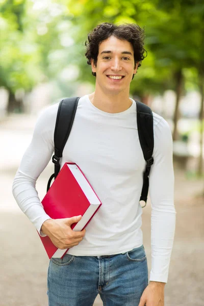 Smiling Student Holding Book — Stock Photo, Image