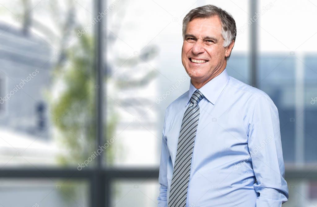 Closeup portrait of a confident mature businessman