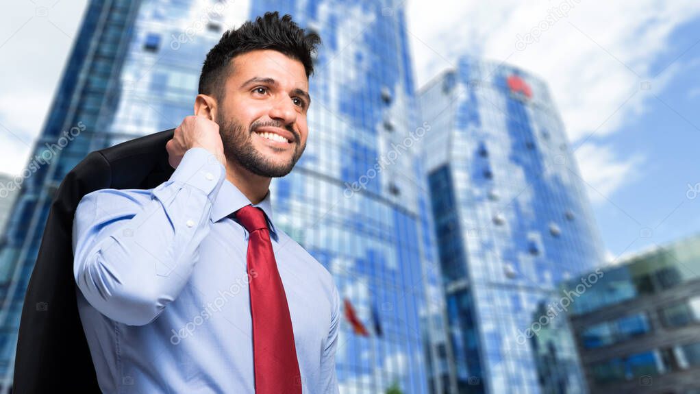 Handsome businessman in the city 