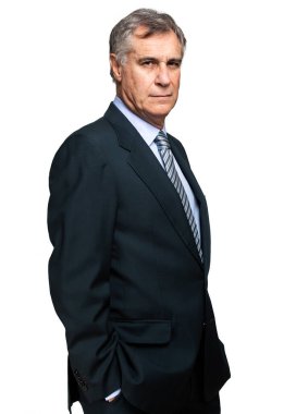 Kendine güvenen olgun bir iş adamının yakın portresi.