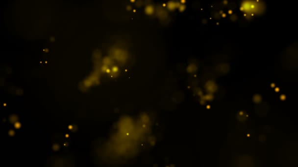 Arany részecskék. Természetes lebegő szerves részecskék a szép pihentető háttér. Csillogó részecskéket a Bokeh. Lassú mozgás. — Stock videók