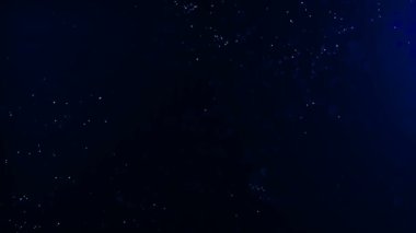 Organik arka plan hareketli ve titreme parçacıkları ile. Güzel arka plan rahatlatıcı.