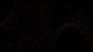 Titreşen parçacıklar, parçacıkların rasgele hareket. Güzel arka plan rahatlatıcı üzerinde. Bokeh ile ışıltılı parçacıklar