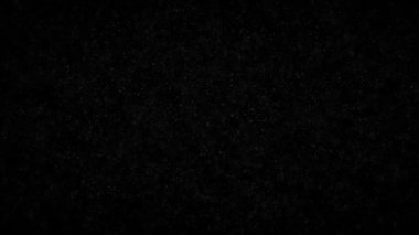 Titreşme parçacıkları, parçacıkların rastgele hareketi. Güzel rahatlatıcı arka plan üzerinde. Volumetrik ışıkta bokeh Ile ışıltılı parçacıklar