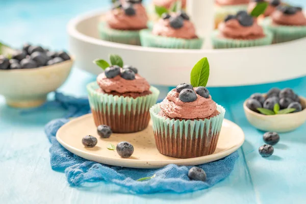 Fresh muffin made of chocolate cream and berries — Stock Photo, Image