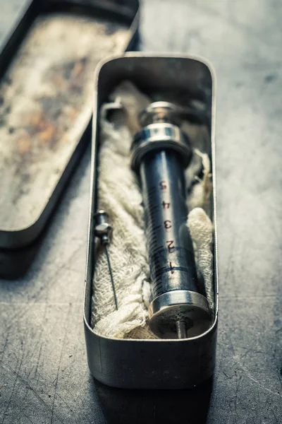 Classic syringes with a needle in a stainless steel container — Stock Photo, Image