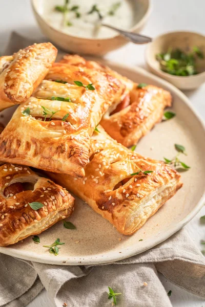Fresh sausage roll with tatar sauce and herbs — Stock Photo, Image