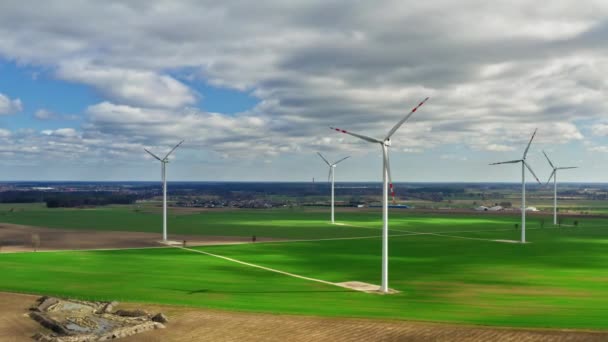 White wind turbines in spring, aerial view, Poland — 비디오
