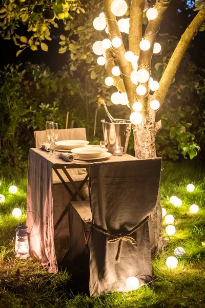 Table for two in evening garden for perfect date