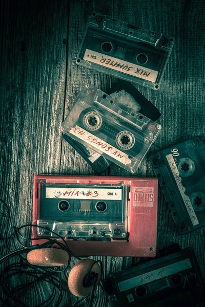 Classic cassette tape with headphones and red walkman — Stock Photo, Image