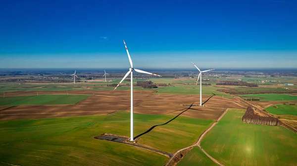 White wind turbines as pure energy, view from above — Stock Photo, Image