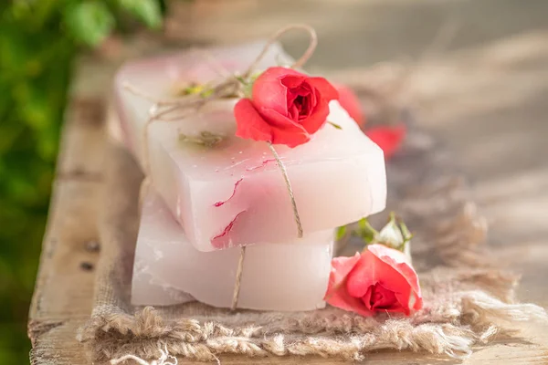 Natural and moisture rose soap in summer garden — Stock Photo, Image