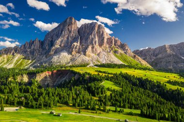 Aerial view of Passo delle Erbe in Dolomites at sunset clipart