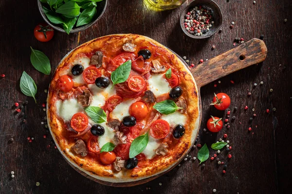 Tasty Pizza Capricciosa Mozzarella Prosciutto Tomatoes Wooden Table — Stock Photo, Image