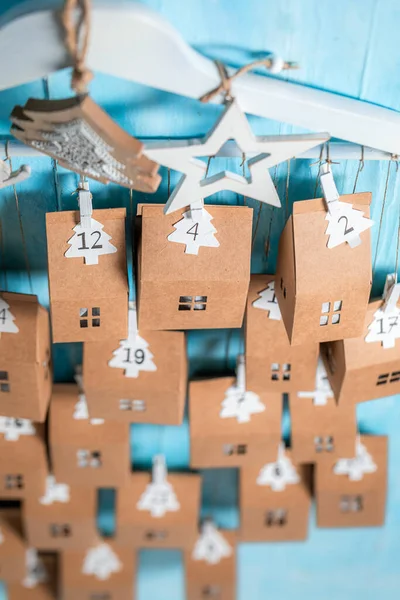 Handmade Christmas Advent Calendar Made Cardboard Stringon Blue Wooden Background — Stock Photo, Image