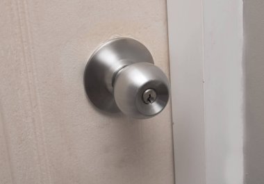 Basic modern door knob with silver color, interior design concept clipart