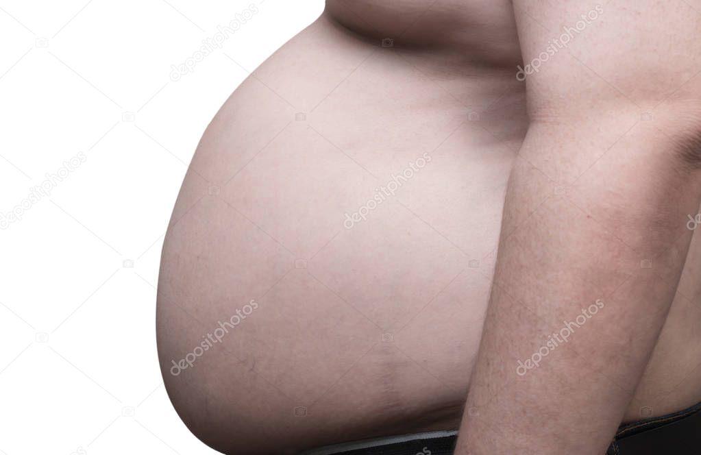 close up side view of overweight obese man and his big belly, isolated in white background. Poor nutrition and increased risk of heart disease.