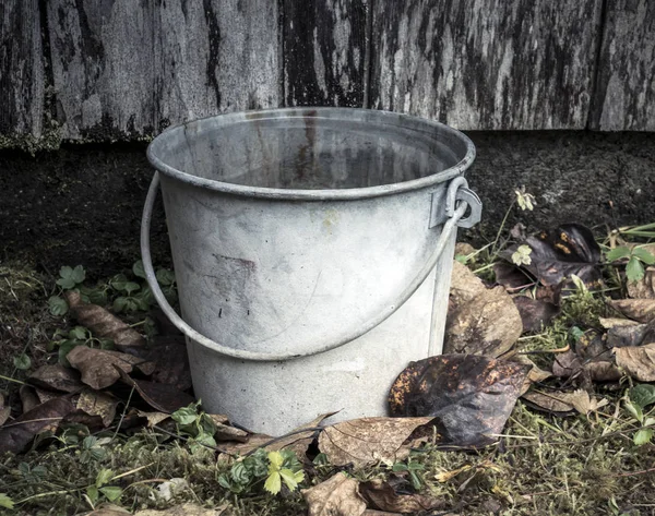 Old Fashioned Bucket Sitting Ground Old Wooden Building Fall Leaves — Stock Photo, Image