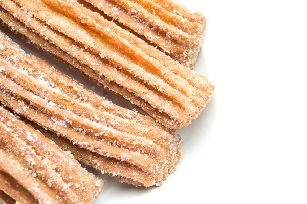 Churros Gestapeld Geïsoleerd Witte Achtergrond — Stockfoto