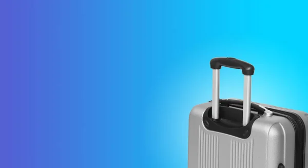 Colorful horizontal banner with suitcase and copyspace. Travelling concept.