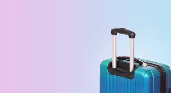 Colorful horizontal banner with suitcase and copyspace. Travelling concept.