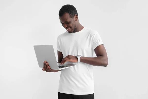 Young Handsome African American Man Standing Holding Laptop Watching Media — Stock Photo, Image