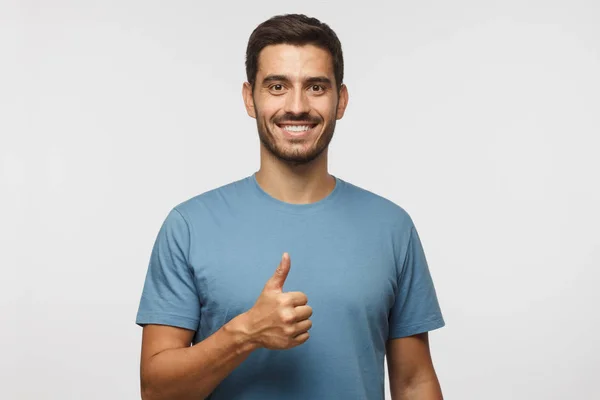 Young Man Isolated Grey Background Showing Thumb Positive Emotions Happiness — Stock Photo, Image