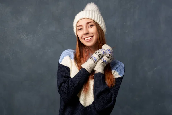 girl with ginger hair wearing knitted woolen thing