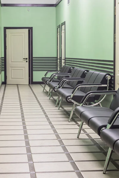 Waiting room. A zone for the expecting people. A corridor with sofas and doors